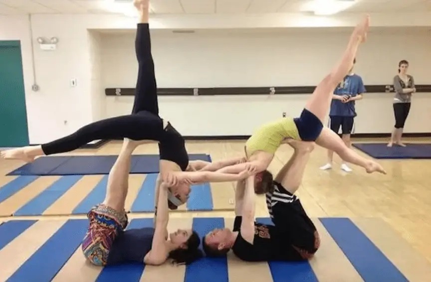 4 poeple yoga pose