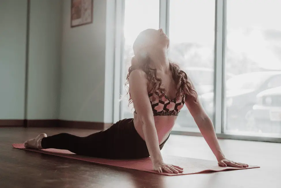 woman playing yoga pose